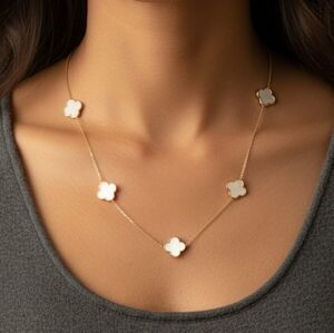 Elegant Gold and White Clover Necklace
